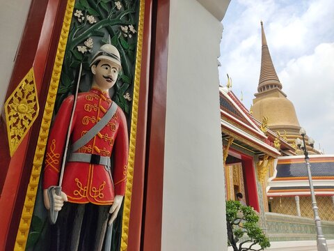 The front entrance with an image of watchman in Wat Ratchabophit, The temple was built during the reign of King Chulalongkorn (Rama V).