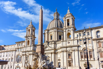 Obraz premium Sant'Agnese in Agone church and Fountain of Four Rivers (Fontana dei Quattro Fiumi) on Piazza Navona square, Rome, Italy