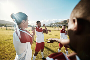 Soccer, team and stretching for fitness, game and wellness on a sport field together outdoor....