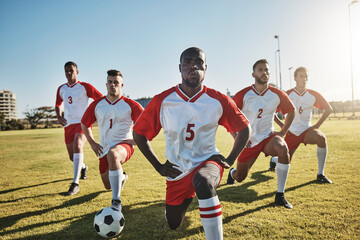 Soccer, men and team stretching on field before sports game or training exercise. Health, fitness...