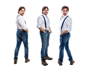 The man is standing half a turn. Red-haired curly guy in jeans and a white shirt with suspenders. Full height. Collage. Panorama format. Isolated on white background.