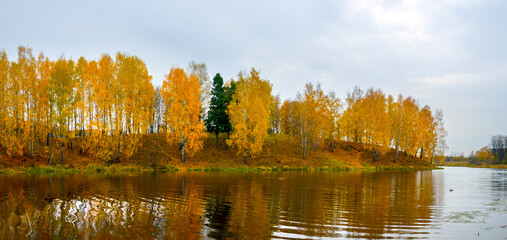 Autumn landscape with lake and trees