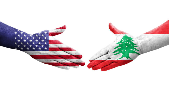 Handshake between Lebanon and USA flags painted on hands, isolated transparent image.
