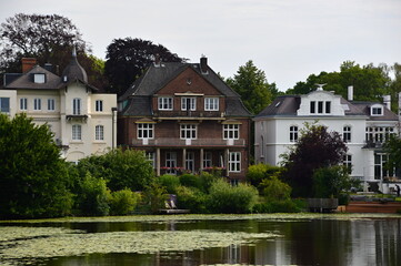 Fototapeta na wymiar Villa at the River Alster in the Hanse City Hamburg