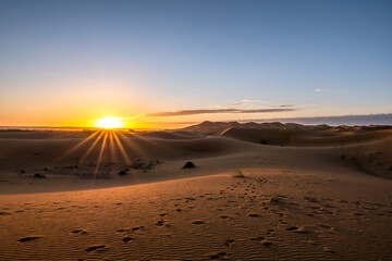 Obraz na płótnie Canvas View at Sunrise in Merzouga at Sahara desert - Morocco