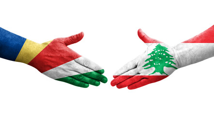 Handshake between Lebanon and Seychelles flags painted on hands, isolated transparent image.