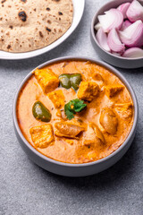 Kadai Paneer is a spicy, flavourful and delicious gravy dish made with  paneer, bell pepper, and onion in a freshly ground spice and served with chappati or lachcha parantha