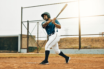 Baseball man, stadium game or hit ball with bat on a sport field in a game. Sports player with...