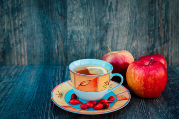Rosehip tea with lemon and apples. Autumn Healthy Tea for Health