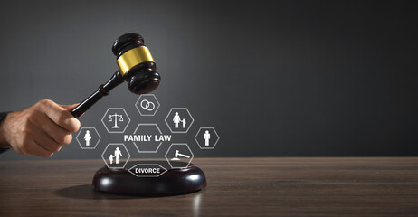 Family Law. Judge gavel on male hand - obrazy, fototapety, plakaty