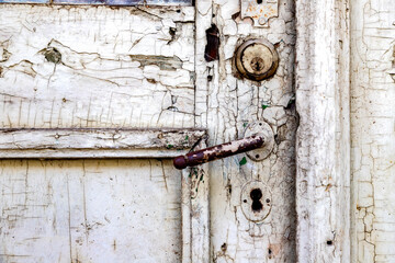Old rustic door close up. Peeled paint