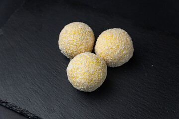delicious Japanese dessert mochi on a black background
