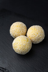 delicious Japanese dessert mochi on a black background
