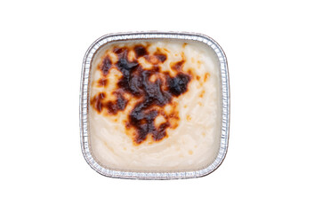 Traditional Turkish milk dessert rice pudding. Known as Sütlaç. Isolated on white background.