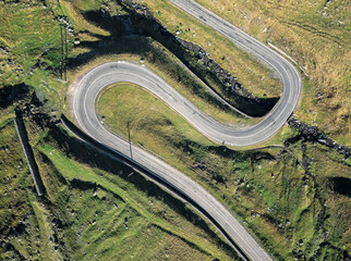 Amazing view of the south part of famous Transfagarasan serpentine mountain road between Transylvania and Muntenia, Romania. Top view.