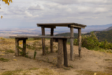 Fototapeta na wymiar Bench with a view in bulgaria mountains