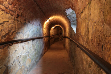 Descent into the basement of the house or the old castle. Refuge.