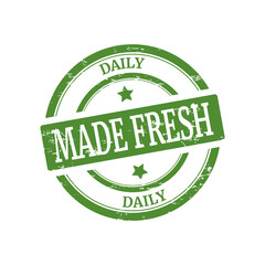 made fresh daily green vintage seal isolated on white