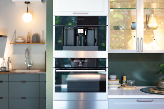 Contemporary and modern Coffee machine building furniture in the kitchen.