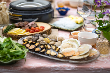 Sukiyaki Premium and Luxury Dinner Set for Celebration with special VIP guests. They have the raw material, beef, pork, chicken, egg, tofu, vegetable, shrimp, shell, squid.