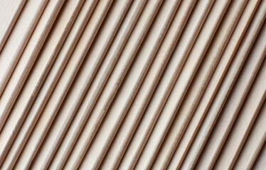 stacked bare wood plank background textures, abstract of unfinished wooden boards for designing