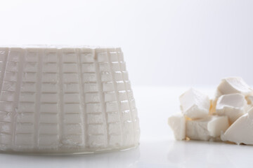 fresh cottage cheese on white background