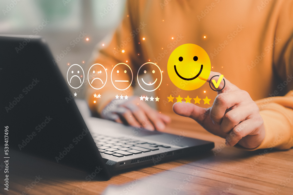 Poster man hand using computer laptop with popup five star icon for feedback review satisfaction service, t