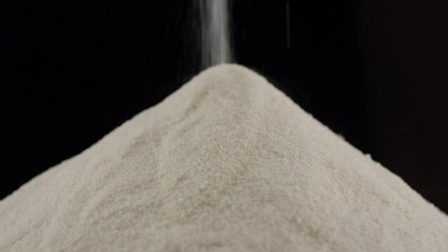 Collagen. Pouring collagen powder. Natural beauty and health supplement