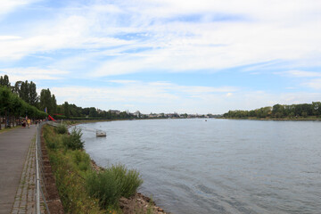 Fototapeta na wymiar Panorama view of river Rhine (Rhein), promenade and cityscape of Bonn, Germany