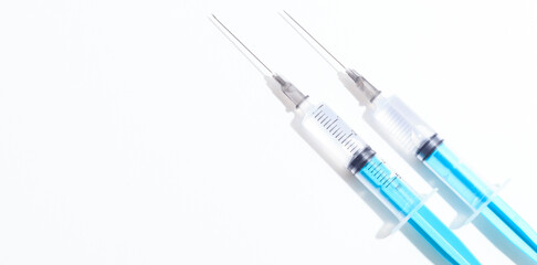 Disposable plastic syringe prepared for injection and vaccination in the hospital. The concept of medicine and health