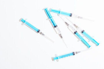 Disposable plastic syringe prepared for injection and vaccination in the hospital. The concept of medicine and health