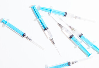 Fototapeta premium Disposable plastic syringe prepared for injection and vaccination in the hospital. The concept of medicine and health