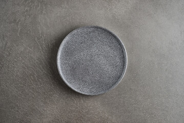 Stone plate on gray surface