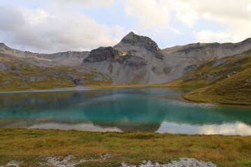 Lago di Rims mountain lake located in Swiss Alps in Val Müstair, Switzerland