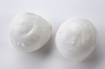 whole mozzarella on white background