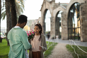 Young couple enjoying a romantic afternoon outdoors