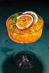 Passion fruit martini cocktail. Sweet pornstar alcoholic drink with fresh passion fruit and lime,...