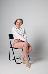 girl sitting in a chair