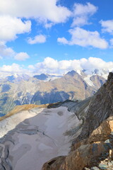 Majestic alpine landscape view of Üssers Barrhorn, Weisshorn and Bishorn covered by Brunegg...