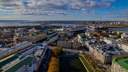 Fototapeta na wymiar Black Lake Park. Kazan autumn cityscape. Aerial view of Kazan city center. View of the Kazan Kremlin and the Kazanka River. 
