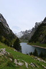 Fototapeta na wymiar Fahlensee lake in a very narrow valley between Bollenwees and Zwinglipass mountain in Appenzell, Switzerland