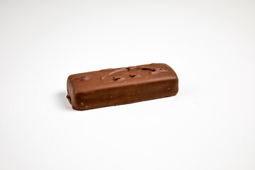 Closeup of chocolate bar isolated on white background