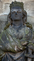 Obraz premium Ancient statue portrait of a princess knight as gatekeeper in Magdeburg Cathedral as Magdeburg, Germany, closeup, details
