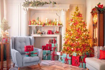 Happy new year interior christmas. Red Decorated glowing tree, armchair with gifts box, fireplace with candles