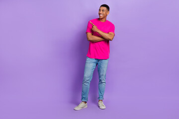 Full length photo of satisfied man stylish clothes arm direct look empty space present recommend shop isolated on purple color background