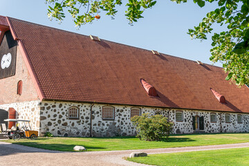 A beautiful and unusual ancient renovated building from stones in Sweden, Wanas. Castle, Scandinavian Swedish style. 