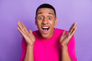 Closeup photo of astonished cheerful positive guy shocked open mouth palms head unexpected surprise offer sale isolated on violet color background