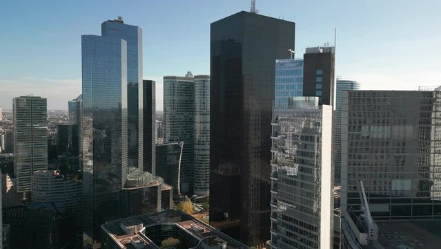 Glass skyscraper buildings at La Défense financial center, Paris in France. Aerial drone view