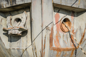 A stranded ship on the bank of the Danube river. View of the bow of a stranded ship on the bank of...