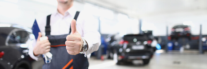 Happy worker in uniform show thumbs up, well done service job